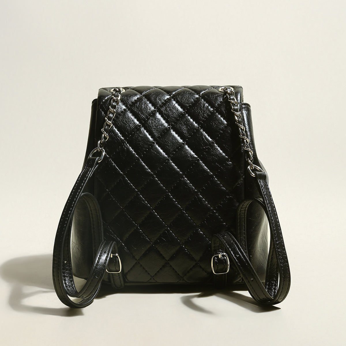 Multi-Pocket Chainstrap Quilted Backpack – Diamond-Quilted Leather Backpack with Silver Chain Straps & Turn-Lock Closure