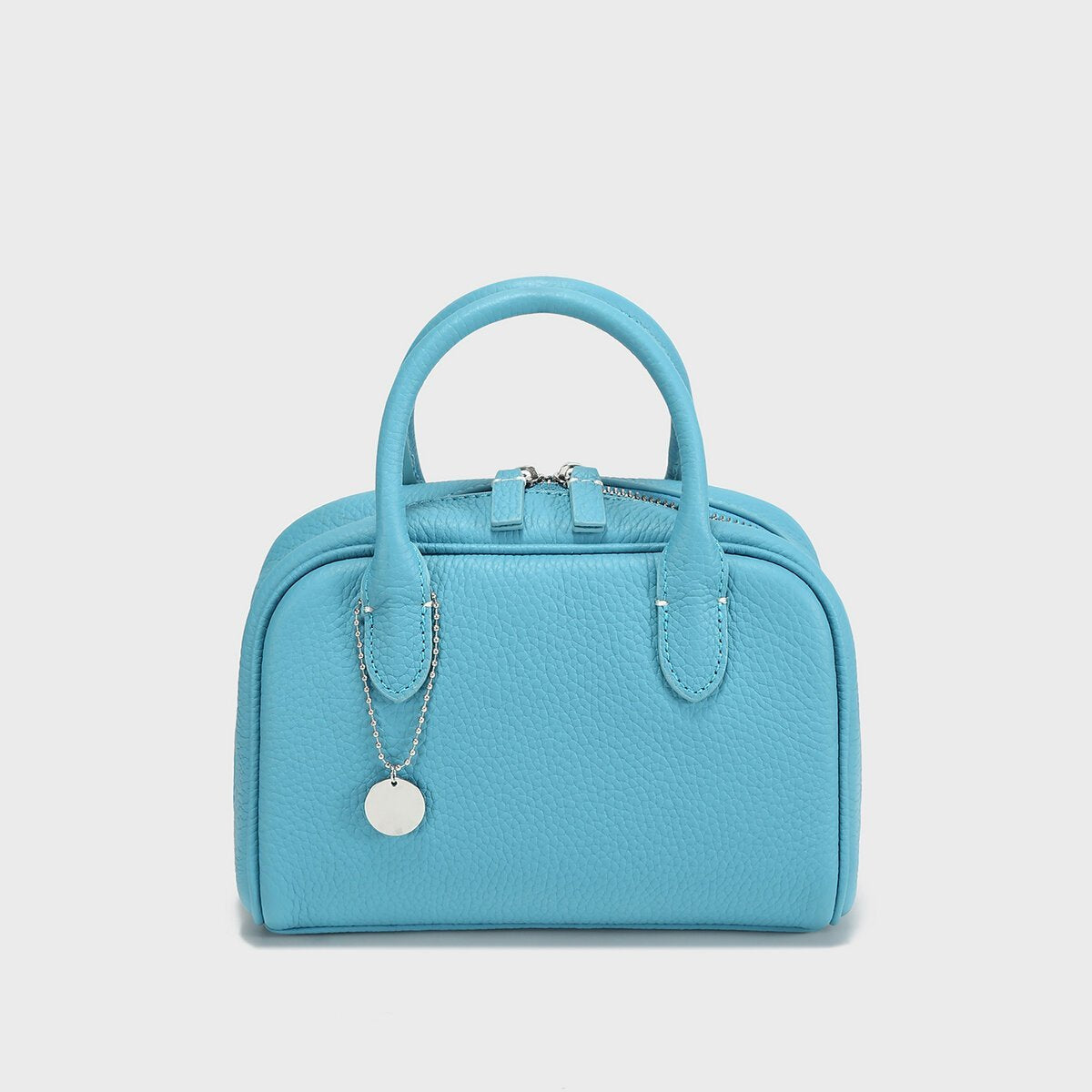 TOGO Leather Mini Bowling Top-Handle Bag – Structured Dome Satchel with Chain Charm