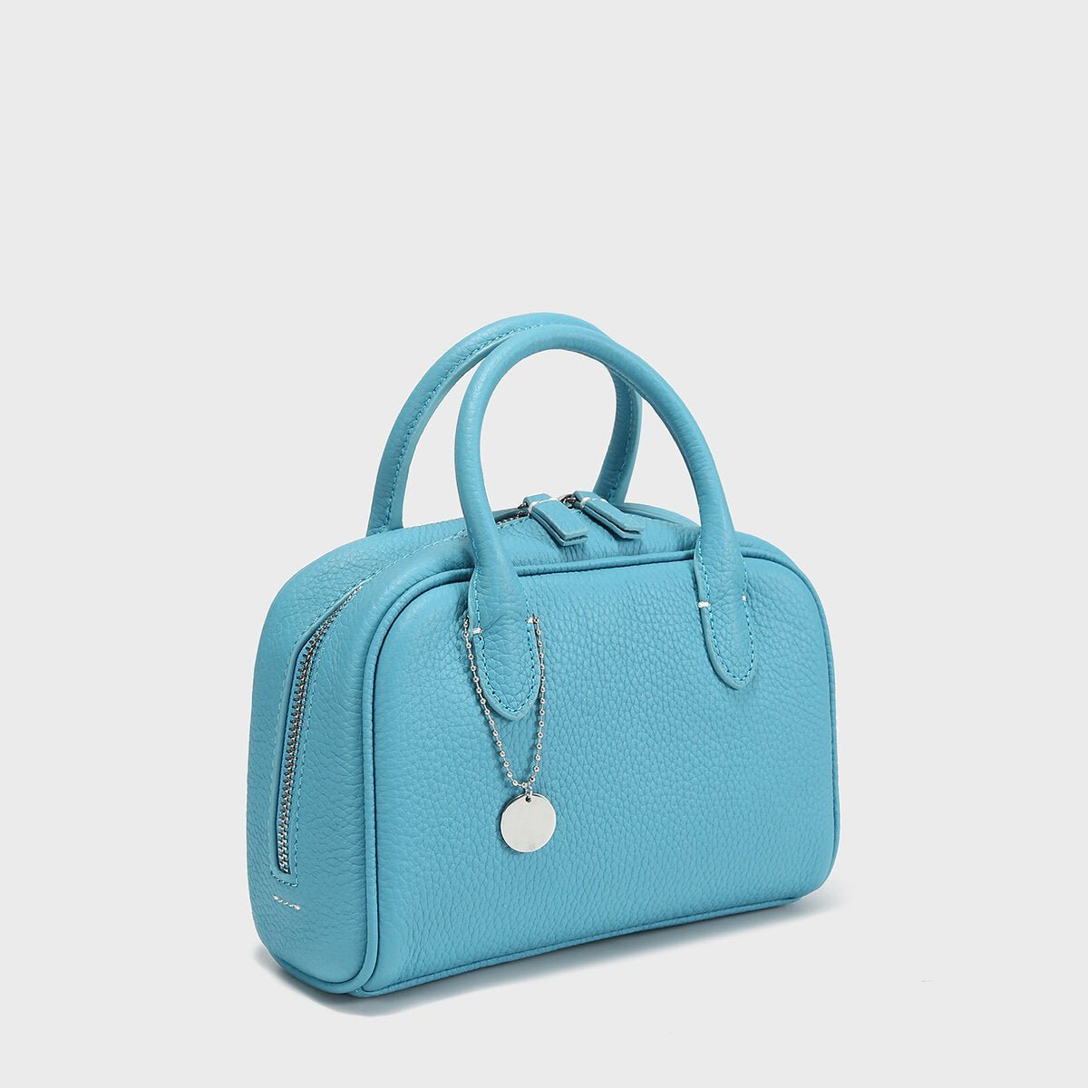 TOGO Leather Mini Bowling Top-Handle Bag – Structured Dome Satchel with Chain Charm